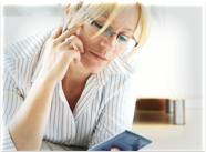 woman researching heating and cooling systems on a smartphone